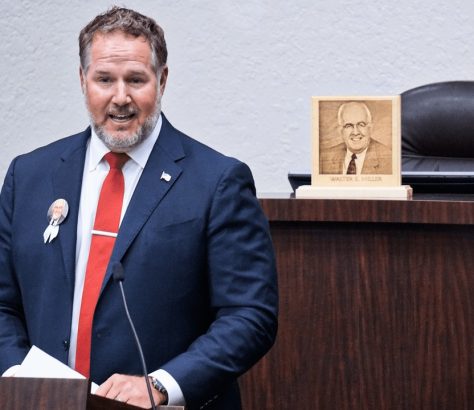 Clay Miller honored his father, Walter, during a ceremony at the Manatee County School Board building in downtown Bradenton